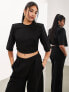 Фото #1 товара ASOS EDITION premium jersey shoulder pad boxy crop t-shirt in black