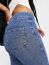 Topshop Petite high rise Jamie flare jeans in mid blue