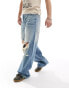 Фото #1 товара Bershka washed distressed denim baggy jeans in blue