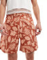 New Era printed shorts in red