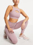 South Beach cut out light support sports bra in violet