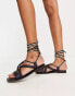 Free People leather wrap sandal in black and cream