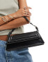 Фото #1 товара ASOS DESIGN structured elongated shoulder bag with contrast stitch in black