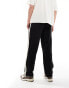 Фото #4 товара ASOS DESIGN wide leg joggers with side taping in black