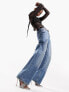 Фото #4 товара ASOS DESIGN baggy boyfriend jean in mid blue