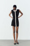 Contrast mini dress with padded shoulders