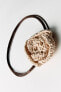 RAFFIA NECK FLOWER