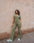 Фото #2 товара Labelrail x Pose and Repeat belted boiler suit in forest green with pink contrast stitch