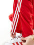 adidas Originals firebird track pants in red