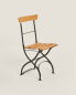 Wooden and metal folding chair