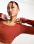 Фото #2 товара Nike Dance long sleeve crop top in rugged orange