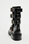 Leather cut-out ankle boots with buckles