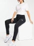 Фото #1 товара New Balance unisex leggings in black