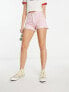 Levi's 501 original distressed shorts in pink