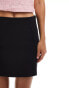 ASOS DESIGN mini skirt with split detail in black