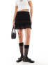 Monki mini ruffle skirt in black