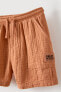 Crepe bermuda shorts with label