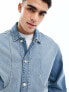 ASOS DESIGN classic fit denim jacket with panelled detail front pockets in washed blue