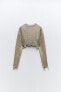 Cropped foil knit sweater