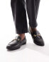 Accessorize snaffle loafers in black