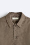 Faded-effect technical overshirt