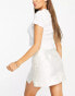 Фото #4 товара ASOS DESIGN daisy embroidered structured mini skirt in ivory