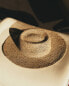 Wide-brimmed straw beach hat