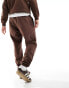 ellesse Garsi logo joggers in dark brown