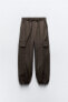 Nylon trousers with zips