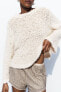 Textured knit sweater