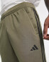 adidas Training Train Essentials 3 stripe joggers in khaki