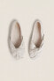 Linen ballerinas with knot detail