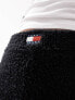 Tommy Jeans badge knit shorts in black