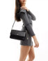 DKNY Bryant leather flap crossbody bag with webbing strap in black