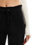 JDY slim fit trousers with frill waistband in black