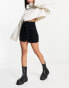 DTT Jordan cord button front mini skirt in black