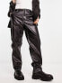 ASOS DESIGN baggy leather look trousers in black