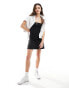 Фото #2 товара Tommy Jeans flared ribbed mini dress in black