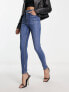 Фото #4 товара ASOS DESIGN push up skinny jean in mid blue - MBLUE