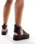 Truffle Collection wide strap sandals in black