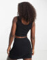 Santa Cruz arch strip crop top in black Exclusive at ASOS