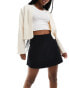 Фото #1 товара ASOS DESIGN supersoft flippy mini skirt in black