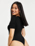 Фото #2 товара ASOS DESIGN Petite skinny fit t-shirt bodysuit in black