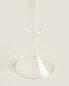 Raised design glass candlestick