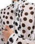 Фото #3 товара ASOS DESIGN relaxed polka dot shirt with tie neck in white and black