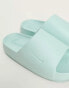 Nike Calm sliders in jade ice blue