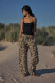 Linen-blend animal-print wide-leg trousers