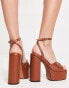 Фото #2 товара ASOS DESIGN Nixie ring detail platform high heeled sandals in tan