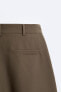 Wide-leg pleated bermuda shorts
