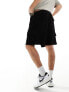 Фото #3 товара ASOS DESIGN oversized ribbed velour shorts in black with cargo pockets